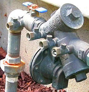 backflow device in backyard small img